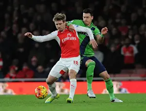 Arsenal V Southampton 2015-16 Prints: Nacho Monreal vs. Jose Fonte: Intense Face-Off in Arsenal vs. Southampton Clash