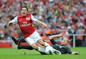 Arsenal v Liverpool 2011-2012 Collection: Nasri vs. Adam: Liverpool's Victory over Arsenal in the 2011-2012 Premier League (0-2)