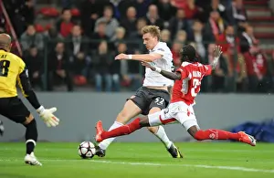 Standard Liege V Arsenal 2009-10 Prints: Nicklas Bendnter shoots past Liege goalkeeper Sinan