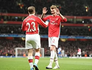 Images Dated 9th March 2010: Nicklas Bendtner and Andrey Arshavin celebrate the 4th Arsenal goal, scored by Emmanuel Eboue