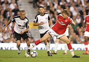 Fulham v Arsenal 2009-10 Collection: Nicklas Bendtner (Arsenal) Bobby Zamora (Fulham)