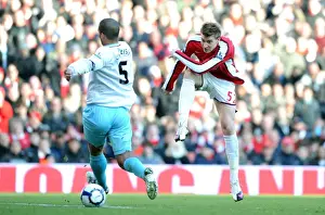Arsenal V Burnley 2009-10 Prints: Nicklas Bendtner (Arsenal) Clarke Carlisle (Burnley). Arsenal 3: 1 Burnley