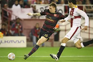 Seville V Arsenal 2007-8 Prints: Nicklas Bendtner (Arsenal) Federico Fazio (Seville)