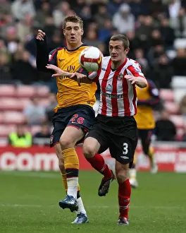 Nicklas Bendtner (Arsenal) George McCartney (Sunderland)