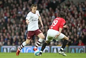 Images Dated 14th April 2008: Nicklas Bendtner (Arsenal) Gerard Pique (Manchester United)