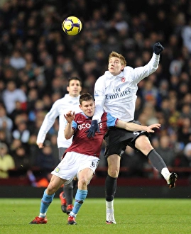 Aston Villa v Arsenal 2009-10 Gallery: Nicklas Bendtner (Arsenal) James Milner (Villa). Aston Villa 0: 0 Arsenal