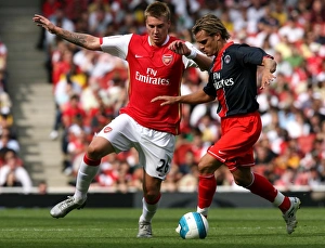 Nicklas Bendtner (Arsenal) Jerome Rothen (PSG)