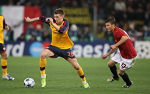 AS Roma V Arsenal 2008-9 Prints: Nicklas Bendtner (Arsenal) Marco Mota (Roma)