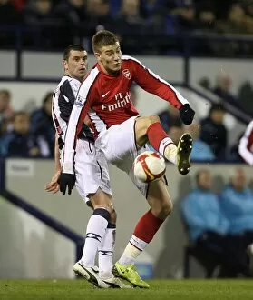 Images Dated 3rd March 2009: Nicklas Bendtner (Arsenal) Paul Robinson (West Brom)