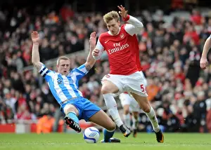 Nicklas Bendtner (Arsenal) Peter Clarke (Huddersfield). Arsenal 2: 1 Huddersfield Town