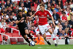 Bendtner Nicklas Collection: Nicklas Bendtner (Arsenal) Raul Garcia (Atletico)