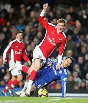 Chelsea v Arsenal 2009-2010 Collection: Nicklas Bendtner (Arsenal) Ricardo Carvalho (Chelsea). Chelsea 2: 0 Arsenal