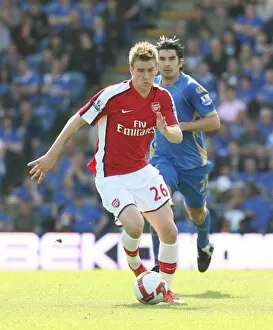 Images Dated 2nd May 2009: Nicklas Bendtner (Arsenal) Richard Hughes (Portsmouth)