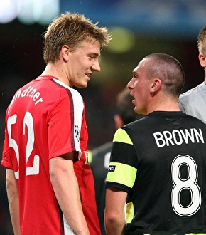 Arsenal v Celtic 2009-10 Collection: Nicklas Bendtner (Arsenal) Scott Brown (Celtic)