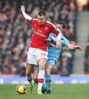 Arsenal v West Ham United 2008-9 Collection: Nicklas Bendtner (Arsenal) Scott Parker (West Ham United)