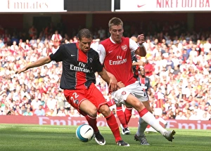 Arsenal V Paris Saint Germain 2007-08 Prints: Nicklas Bendtner (Arsenal) Sylvain Armand (PSG)