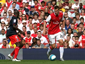 Nicklas Bendtner (Arsenal) Youssuf Mulumbu (PSG) Nicklas Bendtner (Arsenal) Youssuf Mulumbu (PSG)
