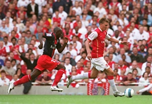 Arsenal V Paris Saint Germain 2007-08 Prints: Nicklas Bendtner (Arsenal) Zoumana Camara (PSG)