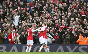 Nicklas Bendtner celebrates scoring the 2nd Arsenal goal with Cesc Fabregas