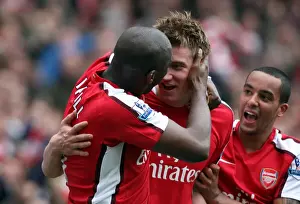 Nicklas Bendtner celebrates scoring Arsenals goal with Sol Campbell