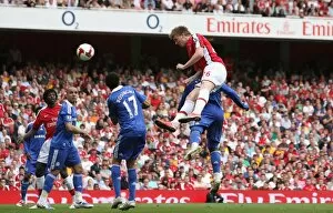 Arsenal v Chelsea 2008-09 Collection: Nicklas Bendtner heads past Chelsea goalkeeper Petr