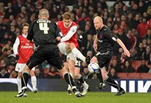 Nicklas Bendtner scores his 2nd goal, Arsenals rd, under pressure from Andrew Whing