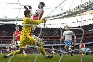 Nicklas Bendtner scores Arsenals goal past Scott Carson (Villa)