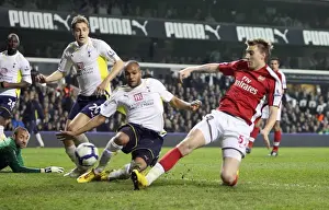 Tottenham Hotspur V Arsenal 2009-10 Prints: Nicklas Bendtner scores Arsenals goal under pressure from Younes Kaboul (Tottenham)