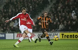 Hull City v Arsenal 2008-9 Collection: Nicklas Bendtner shoots past Hull goalkeeper Boaz Myhill