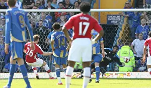 Portsmouth V Arsenal 2008-9 Prints: Nicklas Bendtner shoots past Portsmouth goalkeeper