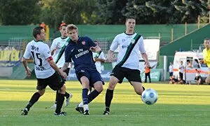 Nicklas Bendtner shoots past Szombathelyi goalkeeper