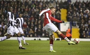 Images Dated 3rd March 2009: Nicklas Bendtner shoots past West Brom goalkeeper Scott