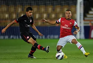 Arsenal U19 V Olympiacos U19 NextGen 2012-13 Prints: Nico Yennaris (Arsenal) Rafail Soukias (Olympiacos). Arsenal U19 0: 0 Olympiacos U19
