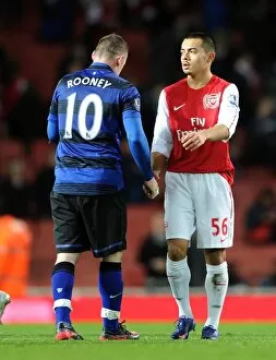 Arsenal v Manchester United 2011-12 Gallery: Nico Yennaris (Arsenal) shakes hands with Wayne Rooney (Man Utd) after the match