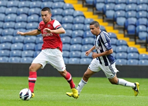 West Bromwich Albion U21 v Arsenal U21 2012-13 Collection: Nico Yennaris (Arsenal) Yassine El Ghanassy (WBA). West Bromwich Albion U21 1: 0 Arsenal U21