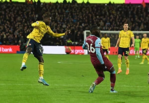 Images Dated 9th December 2019: Nicolas Pepe Scores Arsenal's Second Goal in Premier League Clash Against West Ham United