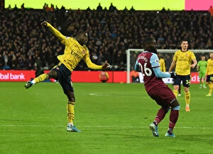 Images Dated 9th December 2019: Nicolas Pepe Scores Arsenal's Second Goal vs. West Ham United (Premier League 2019-20)