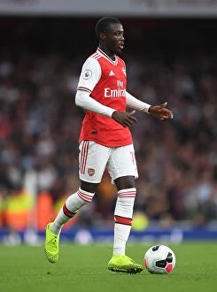 Arsenal v Aston Villa 2019-20 Collection: Nicolas Pepe Shines: Arsenal's Dominant Display Against Aston Villa