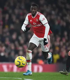 Nicolas Pepe vs Manchester United: Arsenal's Star Forward Faces Off at the Emirates Stadium