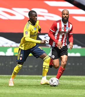 Images Dated 28th June 2020: Nicolas Pepe's Magic Moment: Arsenal Advance to FA Cup Semis Past Sheffield United