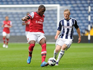 West Bromwich Albion U21 v Arsenal U21 2012-13 Collection: Nigel Neita (Arsenal) Sam Mantom (WBA). West Bromwich Albion U21 1: 0 Arsenal U21