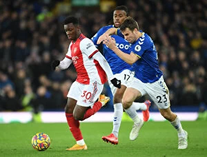 Images Dated 6th December 2021: Nketiah Outwits Coleman: Arsenal's Thrilling Premier League Victory Over Everton