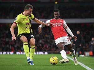 Images Dated 11th November 2023: Nketiah vs Berge: A Battle of Wills in the Arsenal vs Burnley Premier League Clash (2023-24)