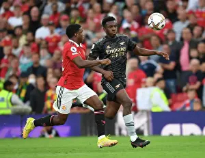 Nketiah vs Malacia: A Premier League Showdown - Arsenal vs Manchester United at Old Trafford (2022-23)