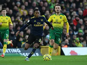 Norwich City vs Arsenal: Joe Willock Clashes with Tom Trybull in Premier League Showdown