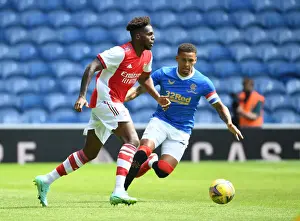 Nuno Tavares Breaks Past Rangers James Tavernier in Arsenal's Glasgow Pre-Season Victory