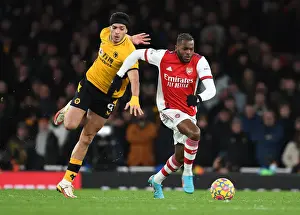 Nuno Tavares Outsmarts Raul Jimenez: A Stunning Moment of Skill from Arsenal's Defender in the Arsenal vs. Wolverhampton Wanderers Match