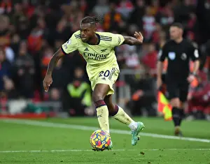 Liverpool V Arsenal 2021-22 Prints: Nuno Tavares Stands Firm: Arsenal's Defensive Hero at Anfield vs
