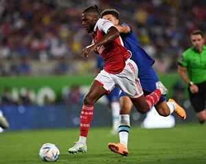 Images Dated 23rd July 2022: Nuno Tavares Stands Out: Arsenal's Star Performance against Chelsea in Florida Cup, 2022-23