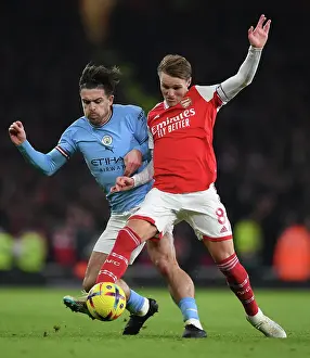 Odegaard Outmuscles Grealish: Arsenal's Midfield Maestro Wins Battle Against Manchester City Star